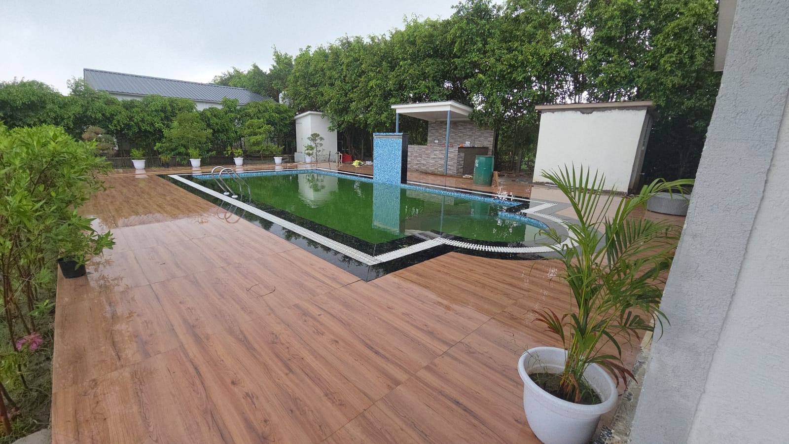 Swimming pool with wooden deck