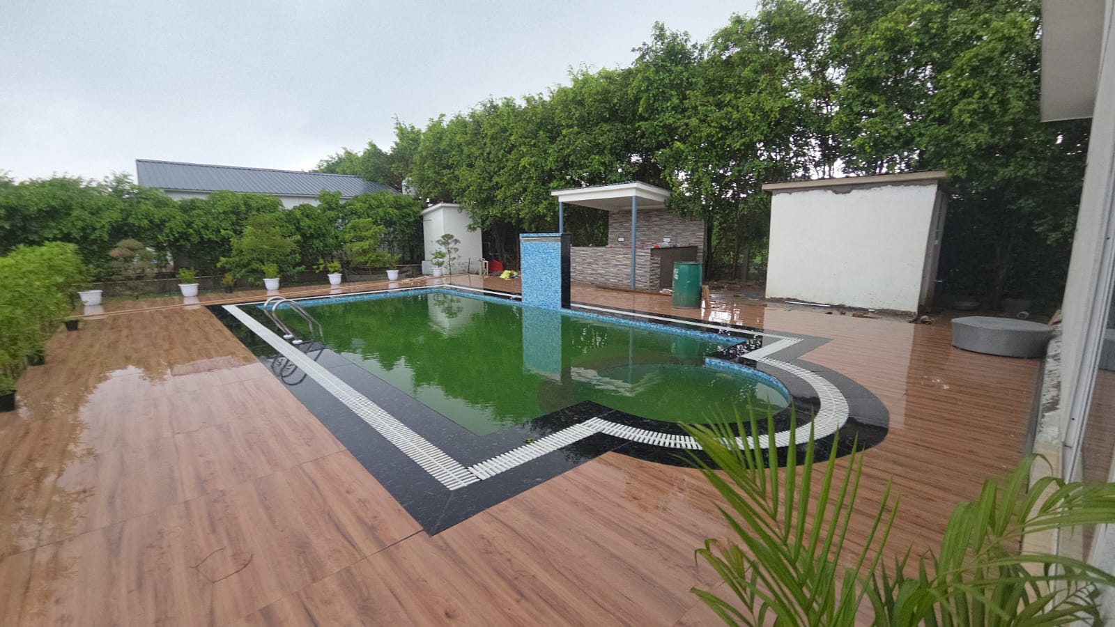 Poolside deck and waterfall