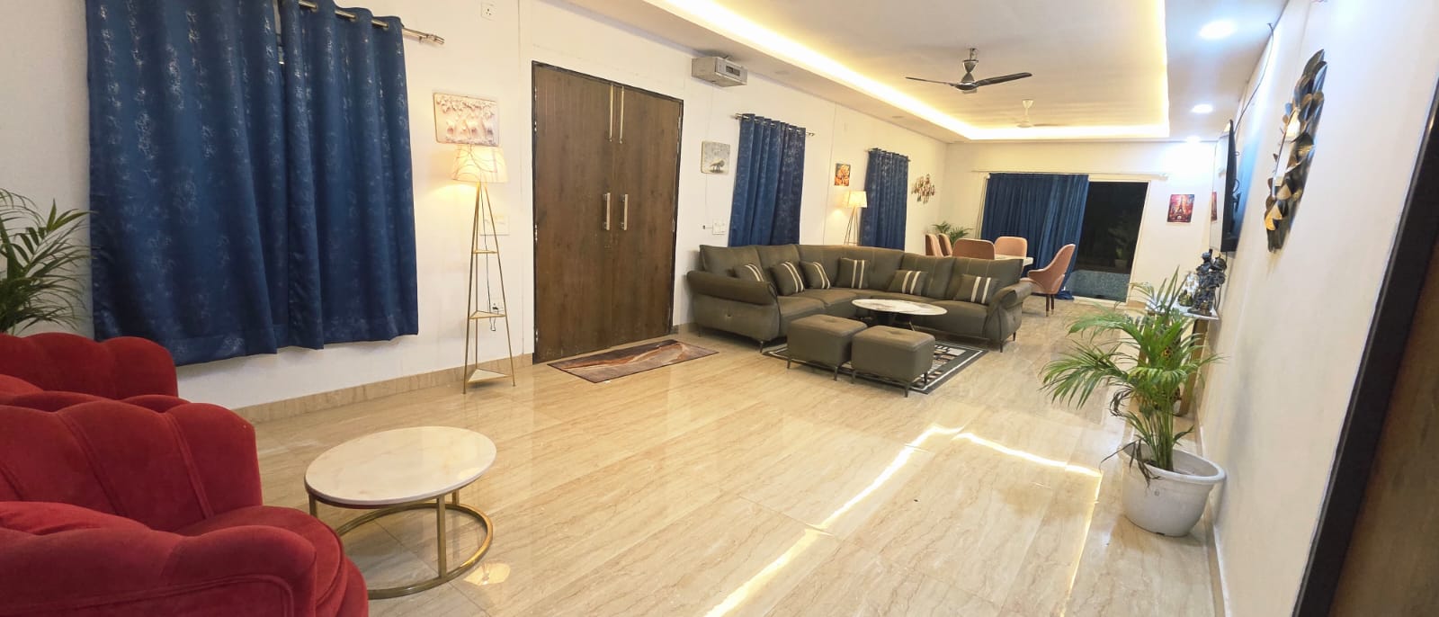 Grand entryway and hall with lounge seating