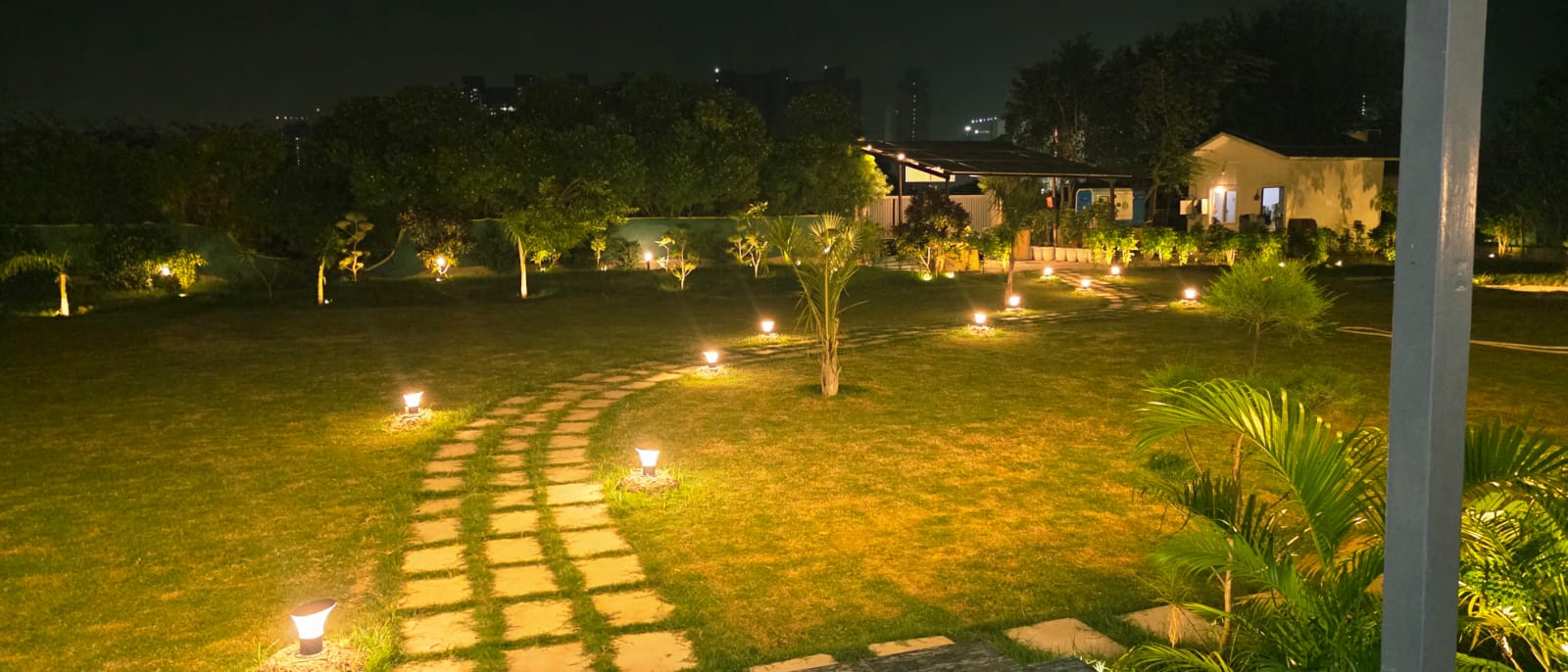Garden pathway with mood lighting at night